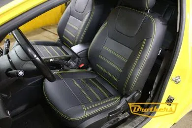 Чехлы на Opel Astra J (GTC), серии "Premium" - желтая строчка